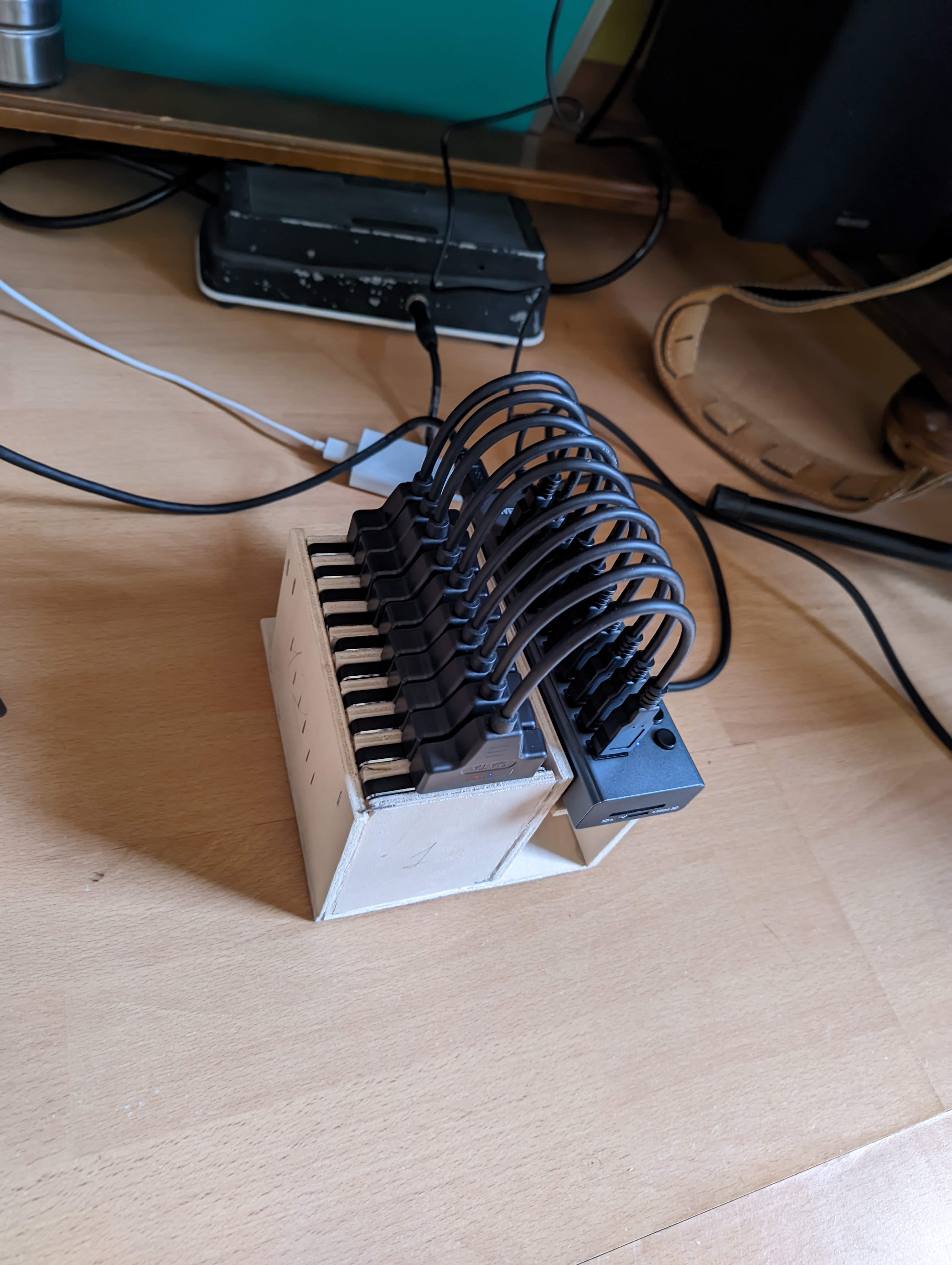 My king of all junk boxes, 4 TB snapraid + mergerfs disk hub. The temperature is okay, the speed is good! all connected to RPi4.